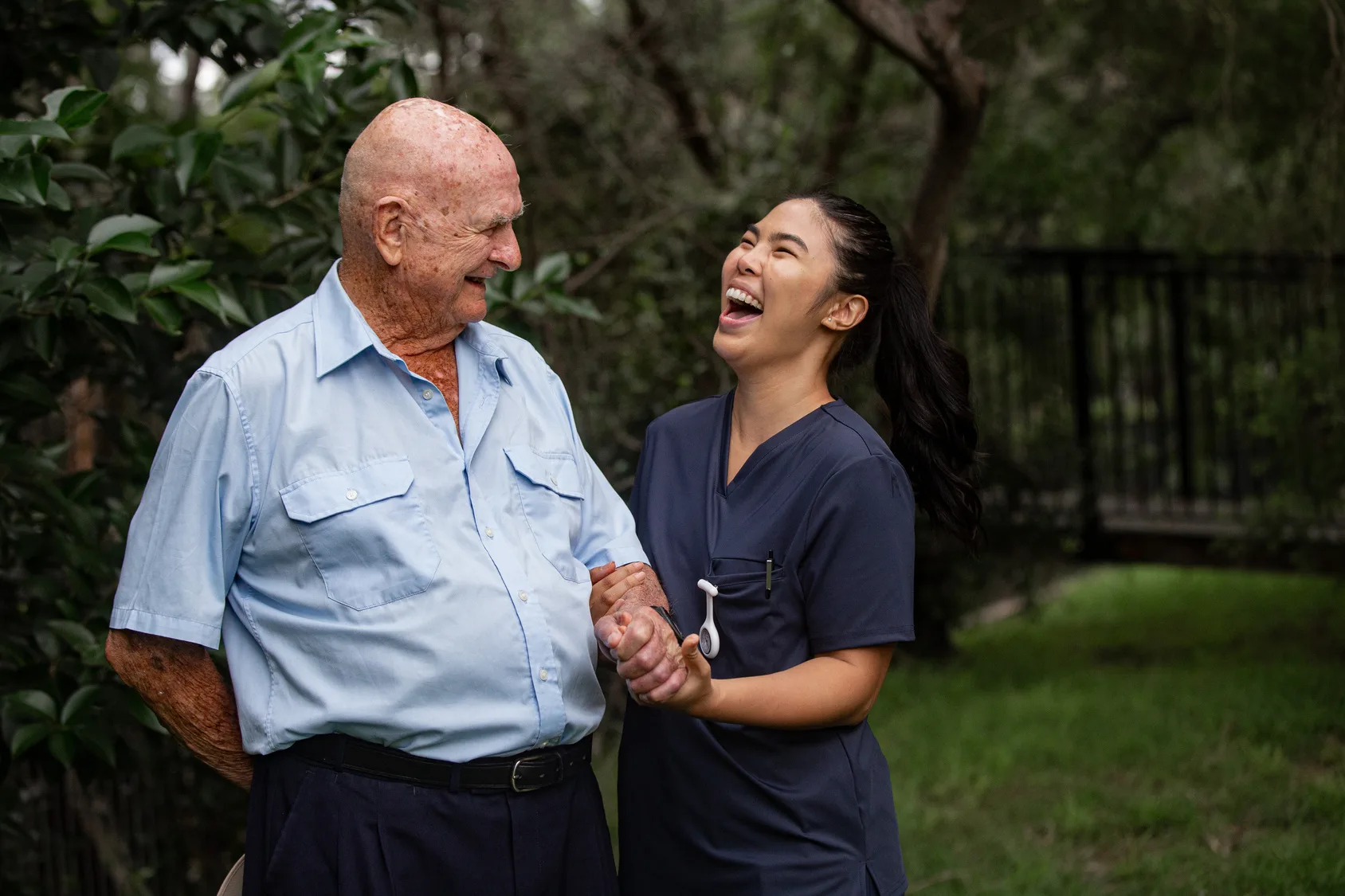 A caregiver smiling with a client